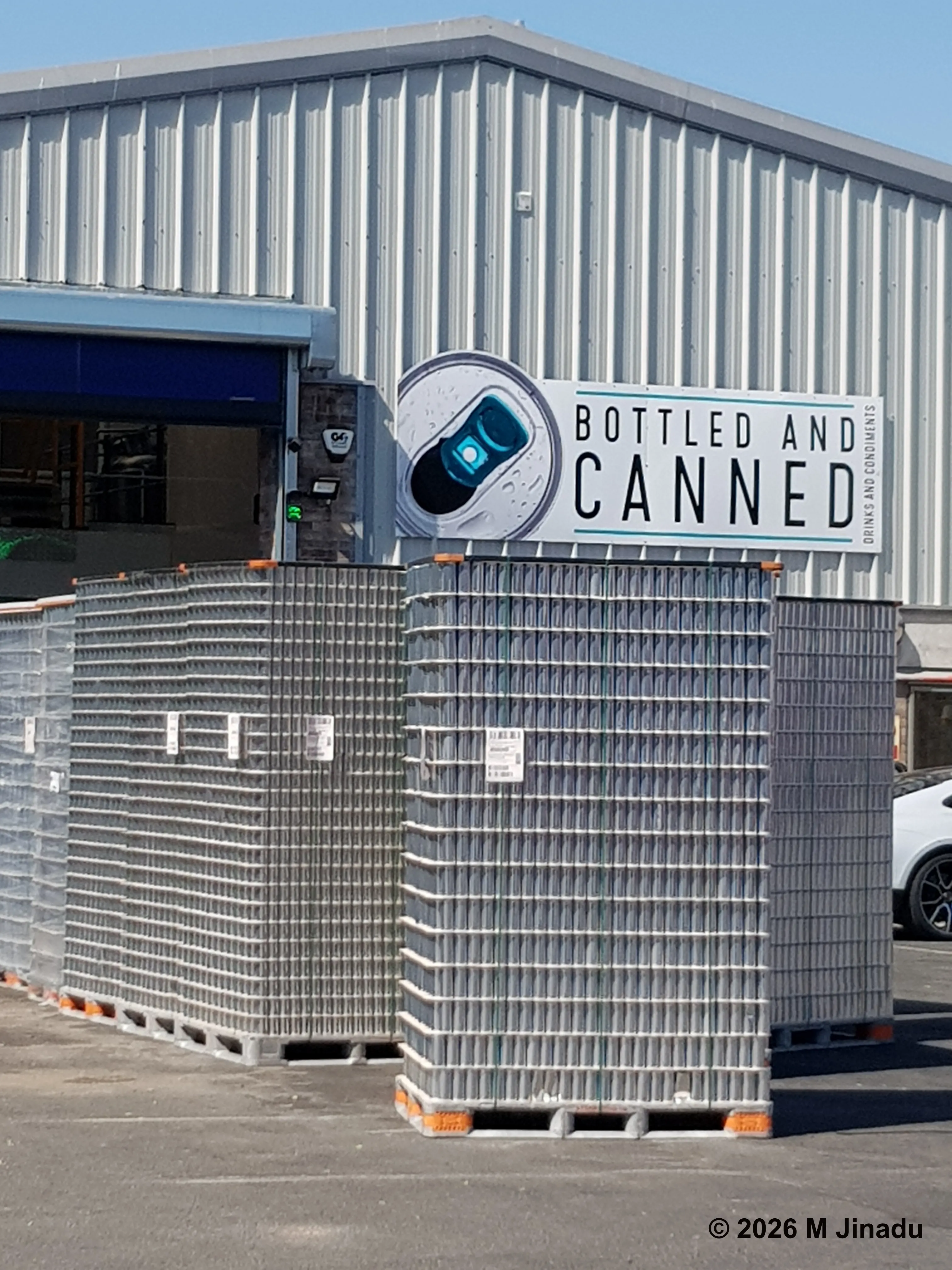 storefront with transport stacks in front